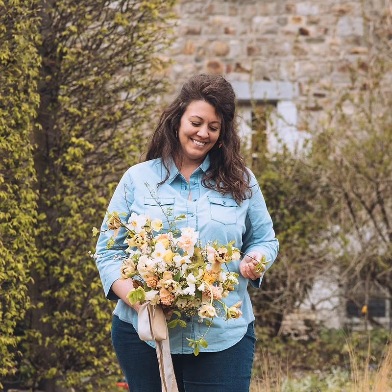 Sethi Smiles Orthodontics Jackie Newns, owner of Red Seeds Floral Design Studio.